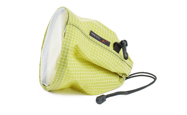 A medium, clear-bottom Yarn Stuff Sack in Wasabi (green with white grid) 200 Halcyon.